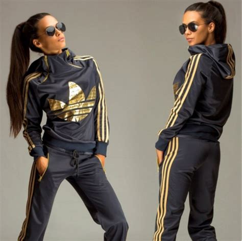 damen adidas anzug schwarz gold|Adidas de trainingsanzug.